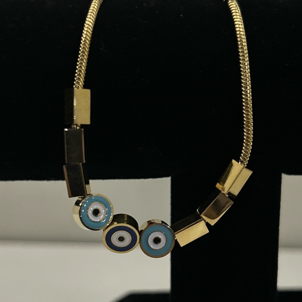 gold plated stainless steel bracelet with evil eyes beads